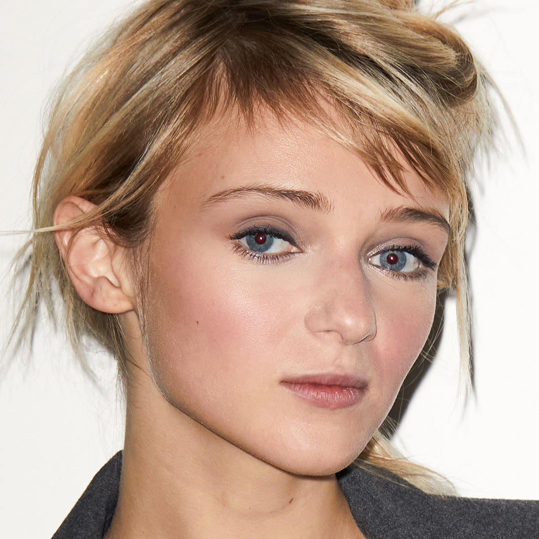 A woman wearing Jones Road Beauty's The Best Eyeshadow in Ash